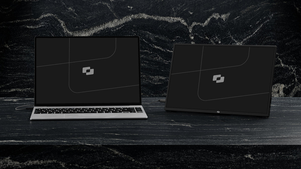 Screenmate One 2,5K naast een laptop