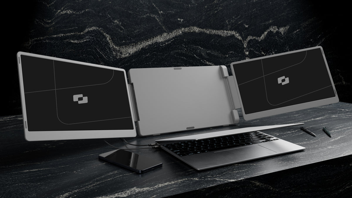 Flip 15.6″ — Screenmate Flip placed behind a laptop with two side screens open