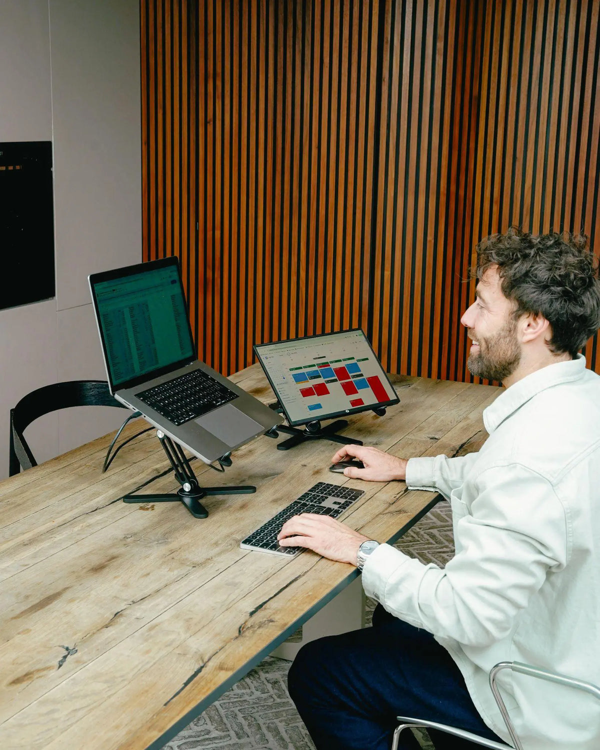 DeskStand set up for a workspace with a laptop and an additional monitor