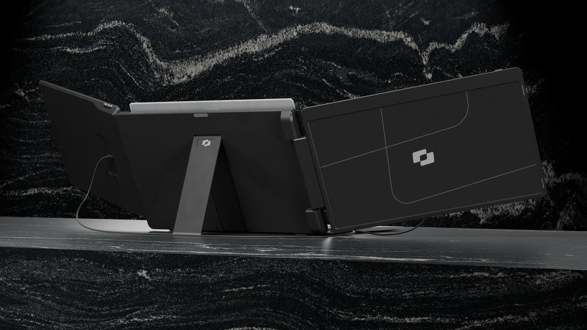 Flip 15.6″ — Screenmate Flip viewed from the back, with one side screen folded forward and the stand visible