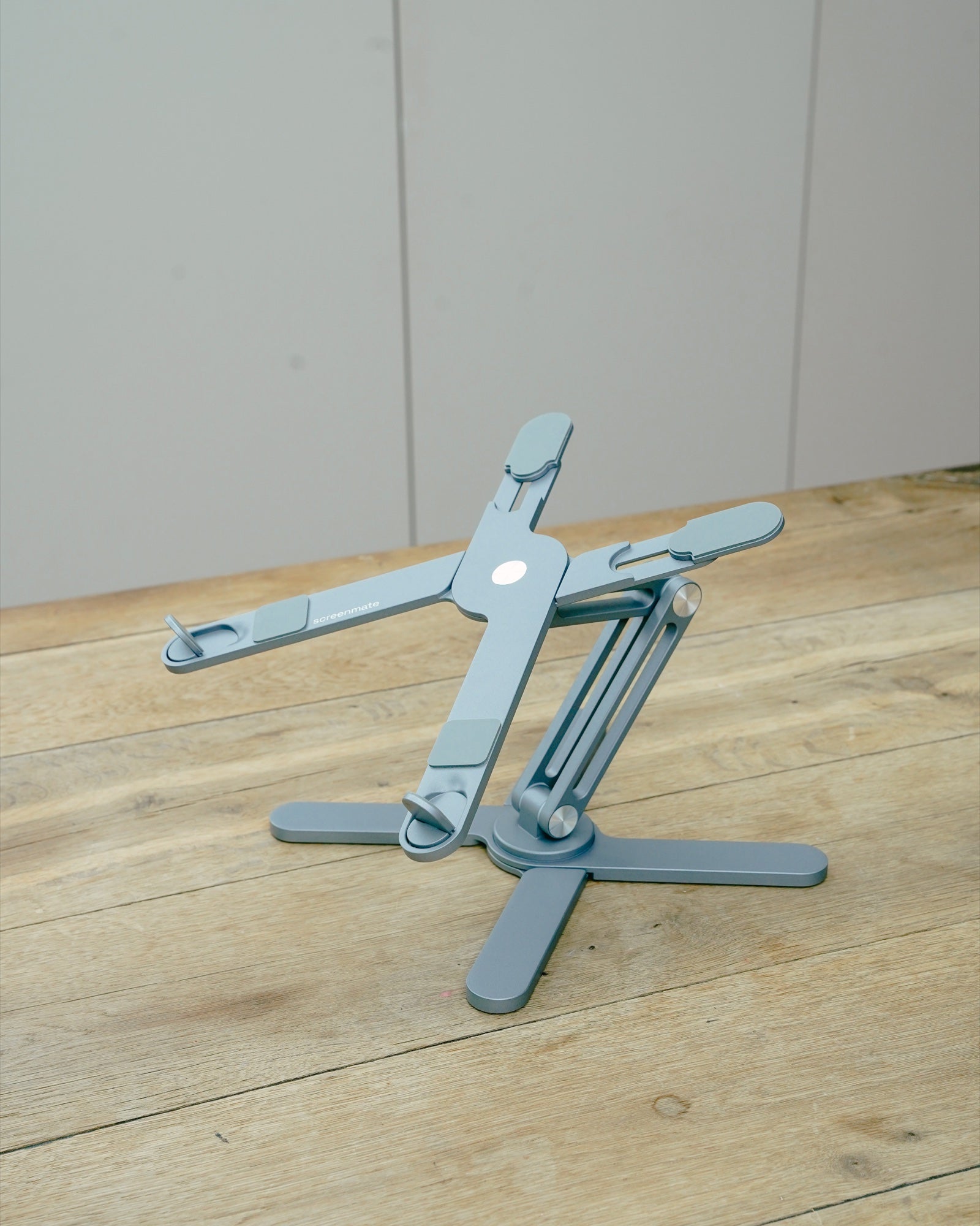 DeskStand with adjustable supports and silicone contact pads — Gray