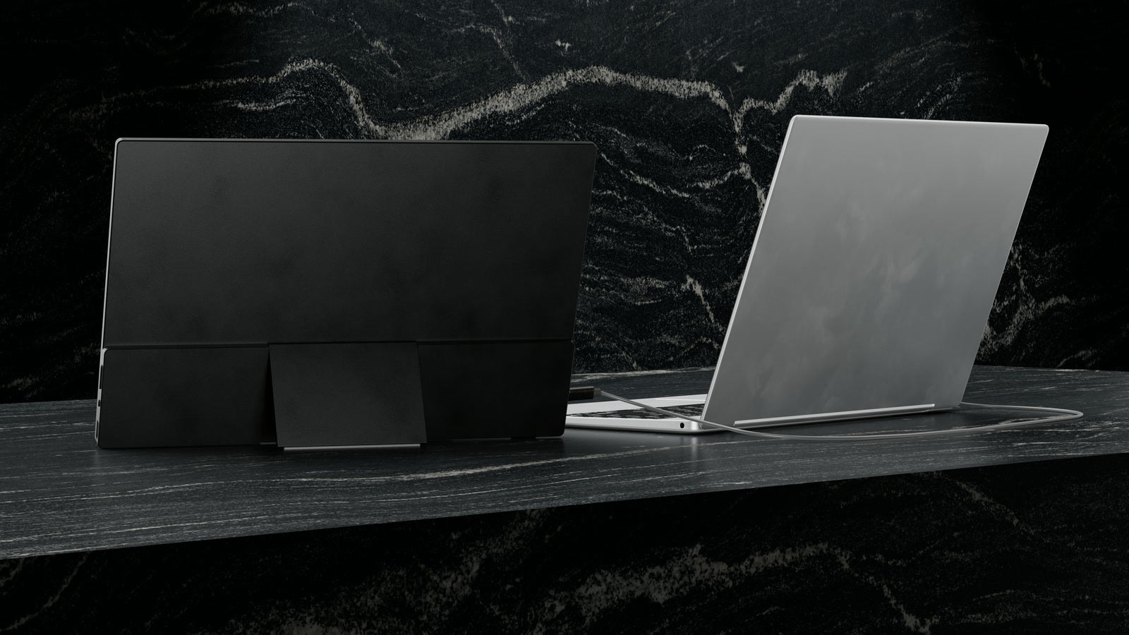 Screenmate One 4K van achteren naast een laptop